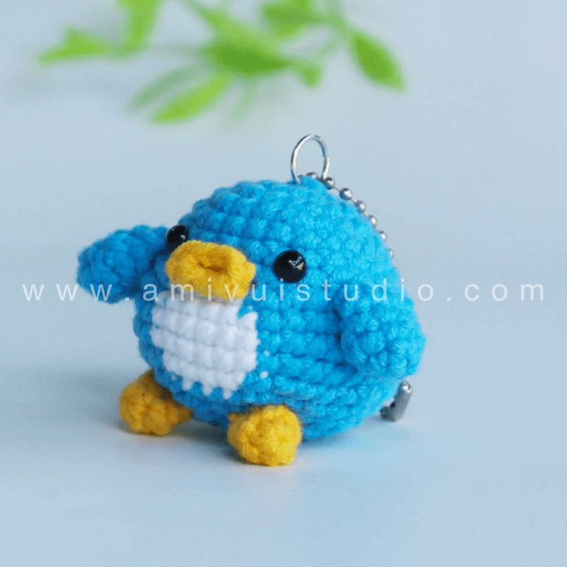 Crochet Penguin keychain - Free Amigurumi Pattern by AmivuiStudio