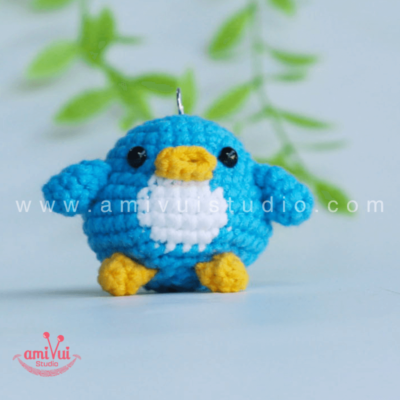 Crochet Penguin keychain - Free Amigurumi Pattern by AmivuiStudio