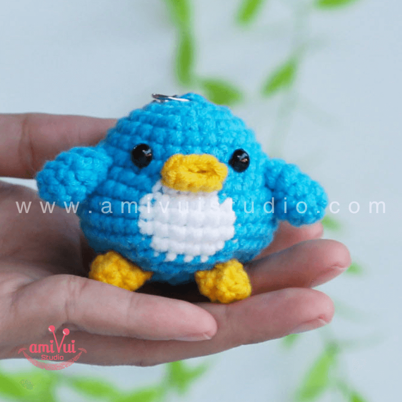 Crochet Penguin keychain - Free Amigurumi Pattern by AmivuiStudio