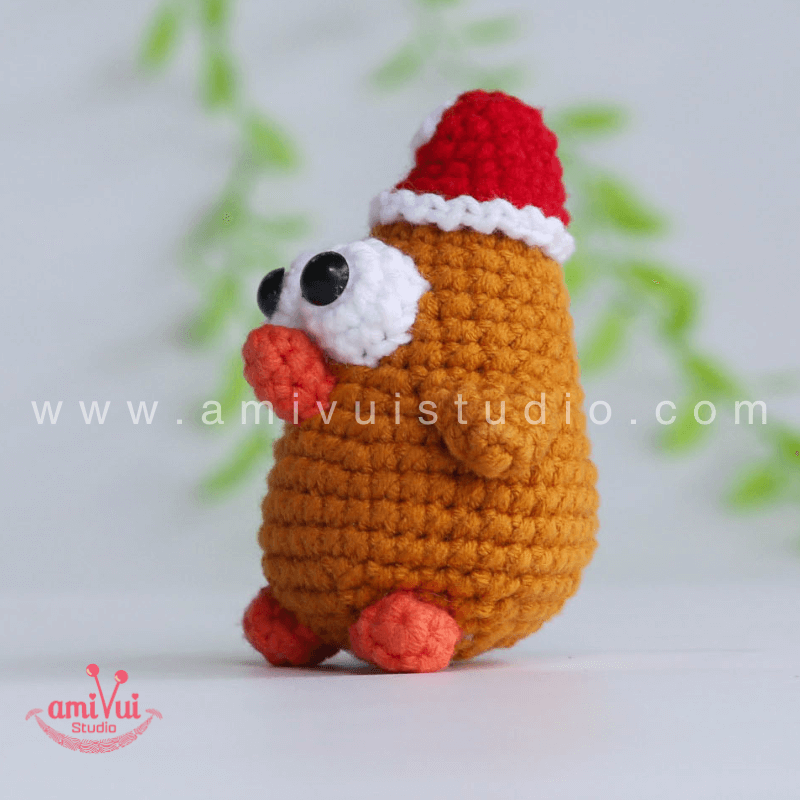 Crochet Chicken in Santa hat keychain - Free Amigurumi Pattern by AmivuiStudio